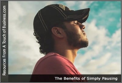 a man looking up at the sky with his eye closed