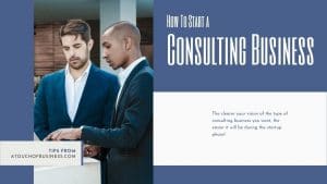 two men talking in the lobby of a company