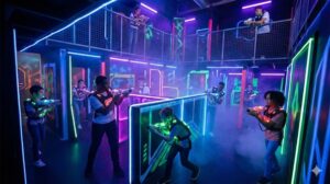Players competing in a modern laser tag arena with neon lighting, futuristic obstacles, and glowing tactical gear.