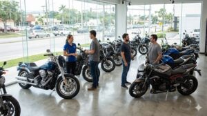 A motorcycle dealership showroom with diverse bikes, sales staff interacting with customers.