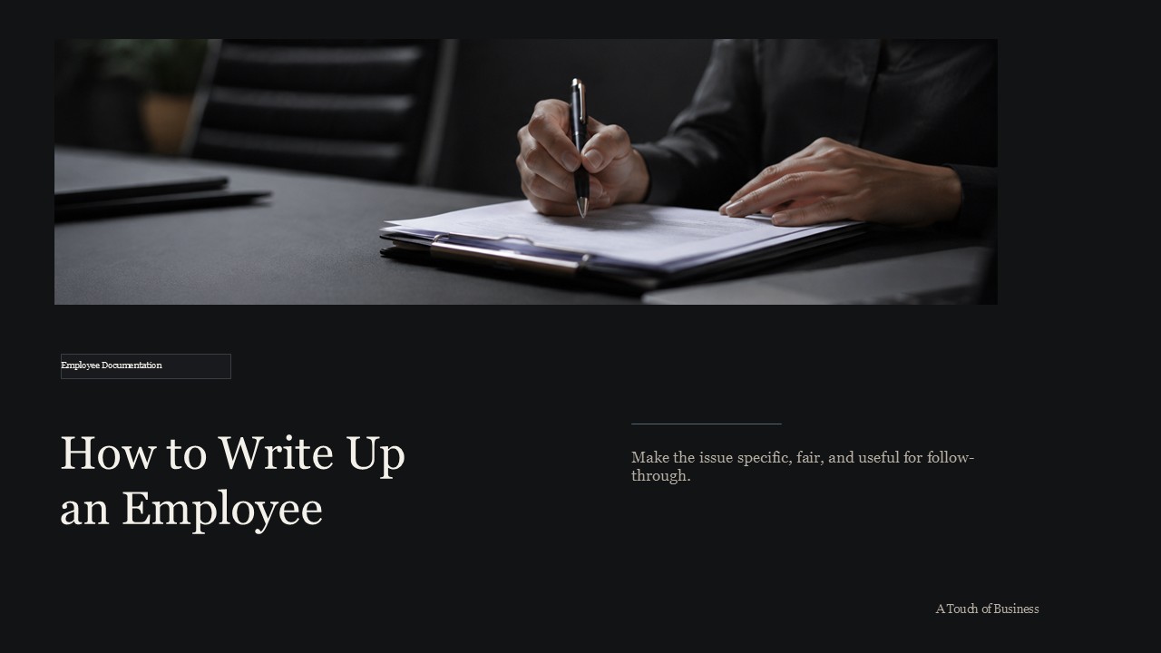 Hands writing on employee paperwork clipped to a folder in a moody office setting.