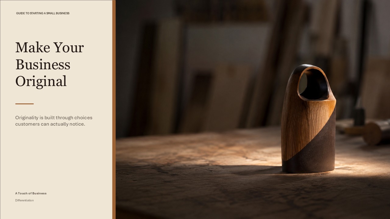 Handcrafted wood-and-dark material prototype on a warm workshop table.