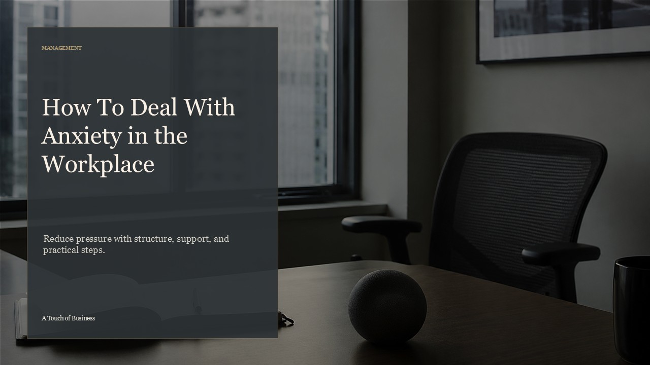 Realistic cinematic image of a quiet office desk with open notebook, stress ball, city window, and empty chair for a management article.