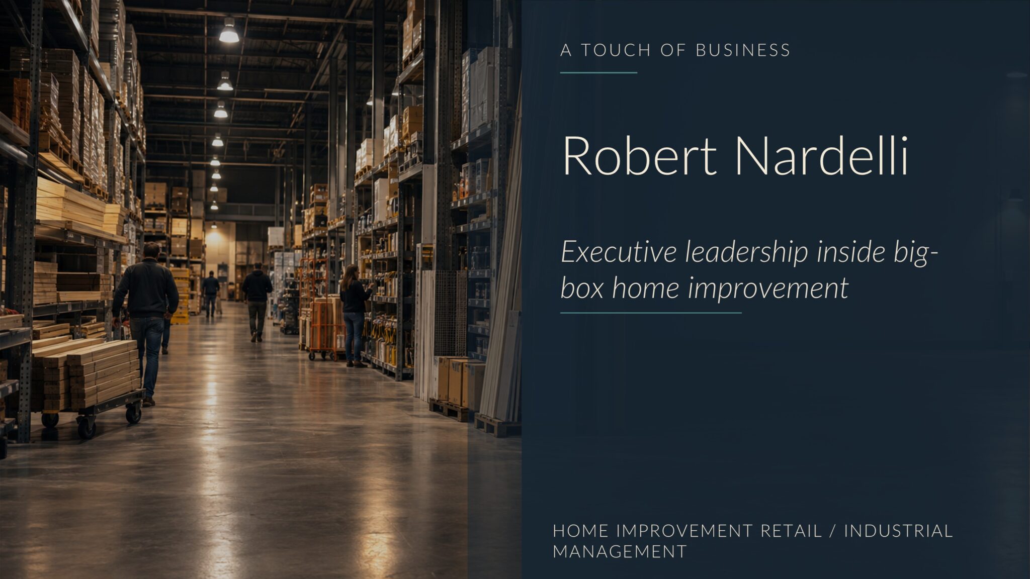 Low-light home-improvement warehouse aisle with lumber racks, shoppers, carts, and polished concrete.