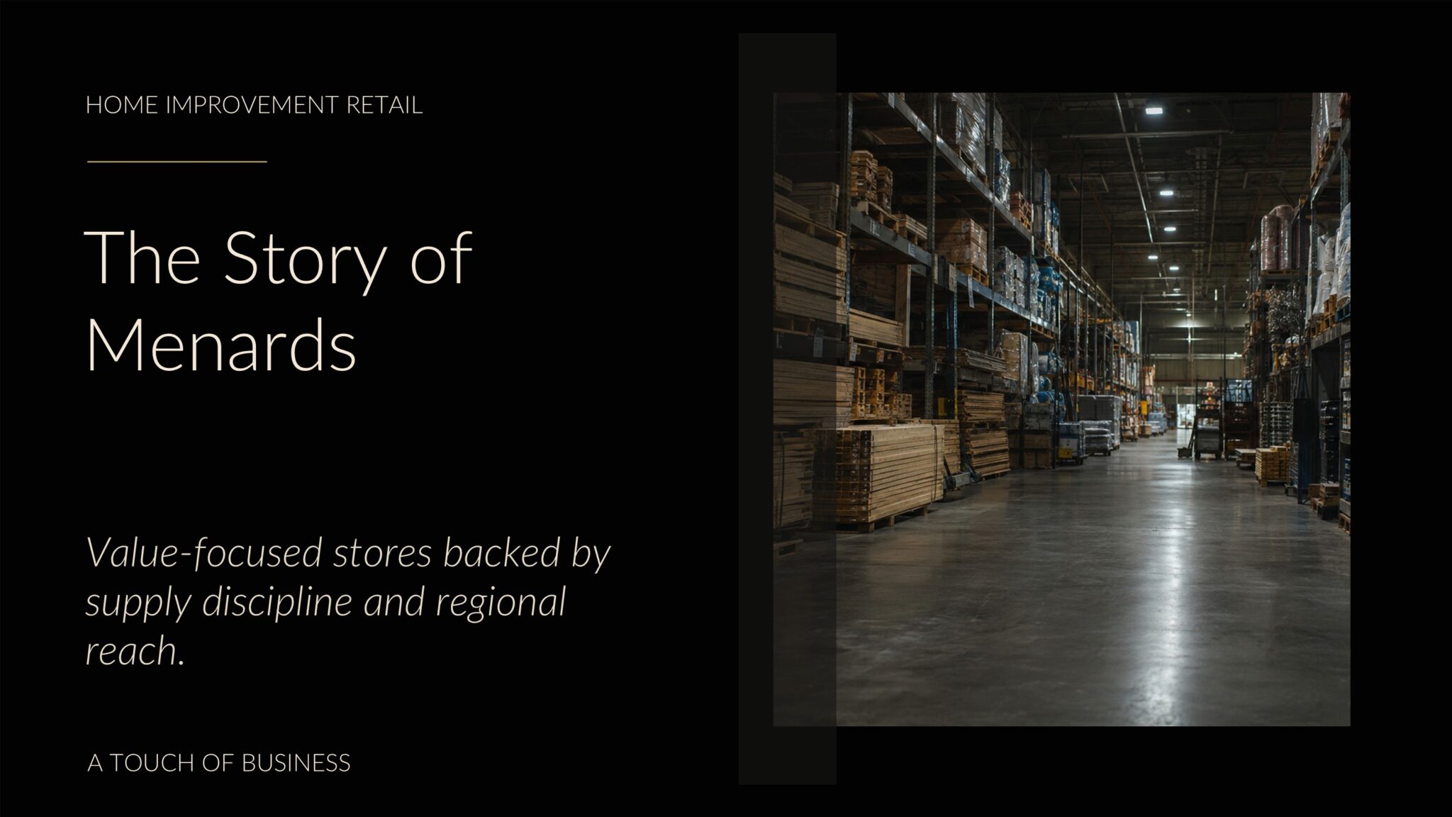 Long dim hardware warehouse aisle with lumber, ladders, insulation, and boxed supplies.