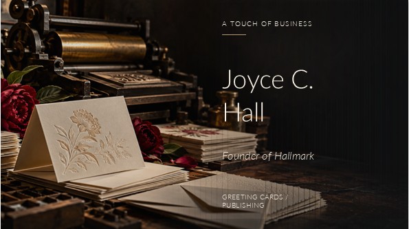 Embossed greeting cards and stationery beside a brass letterpress on a rustic workbench.