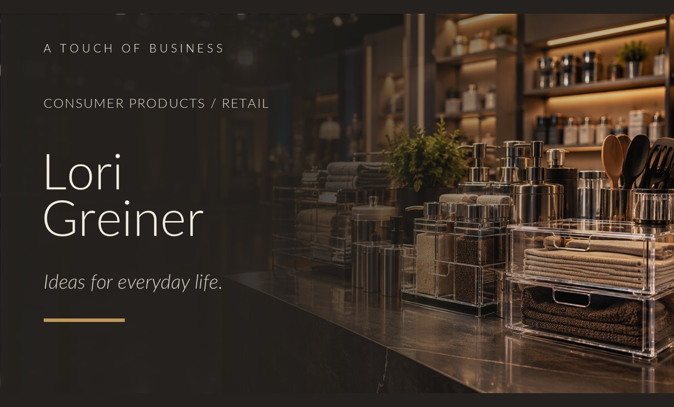 Organizers, kitchen accessories and folded textiles displayed in a warm retail studio.