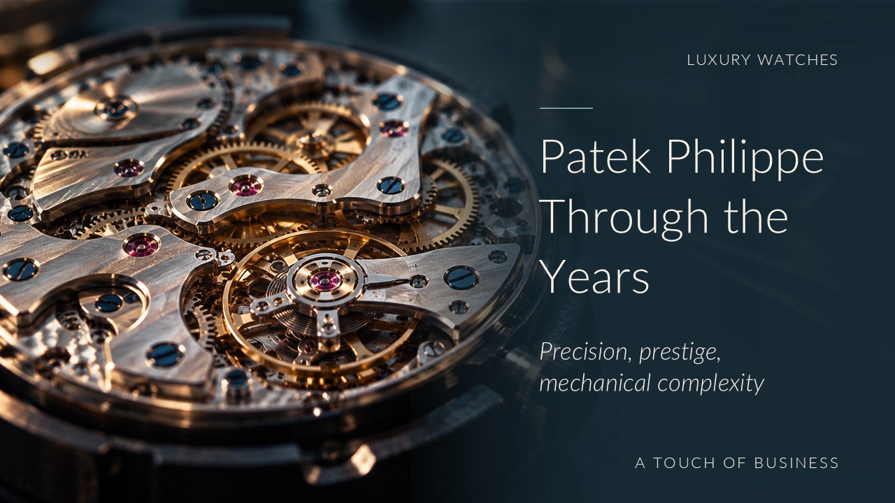 Macro view of an intricate unbranded mechanical watch movement beside watchmaking tweezers and loupe.